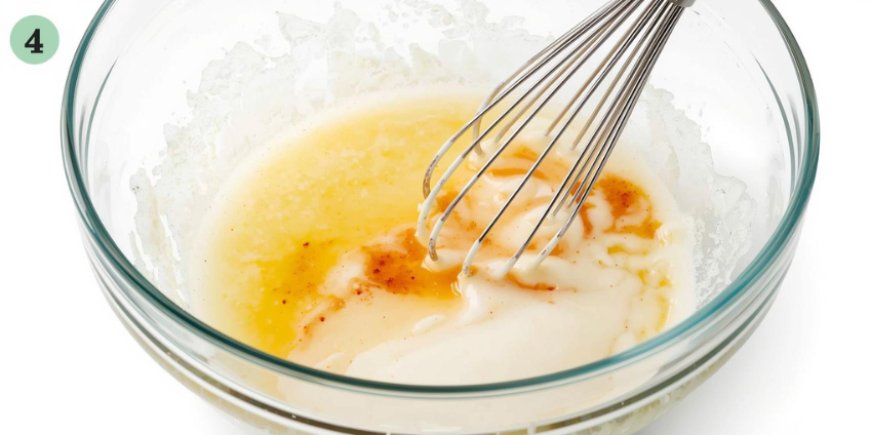 Whisk the egg yolks and cream.