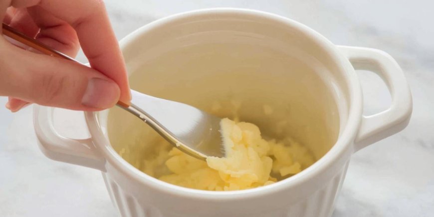 Butter the egg cocottes.