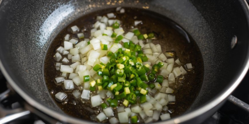 Cook the onions and chilli.
