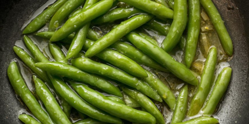 Warm the broad beans.