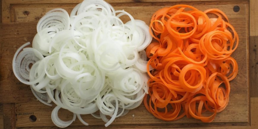 Cut the onions and carrots.